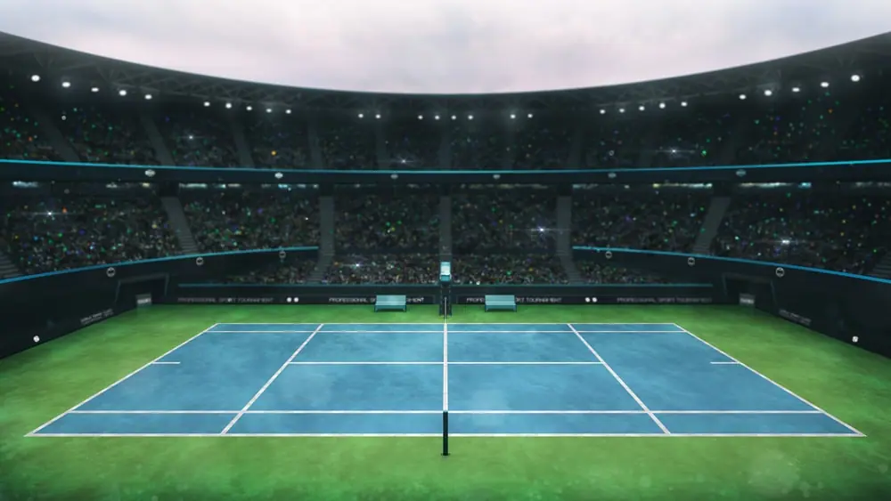 Tennis court in an empty stadium under lights